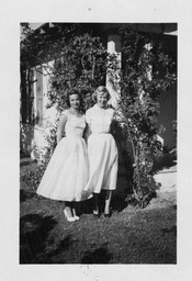 Students on campus, two women students, 1951