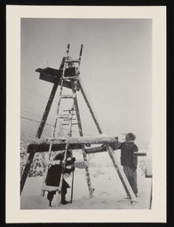 Dr. Church and colleague constructing wind charger support, copy 2