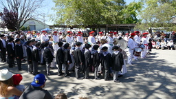 Marching band and young Basque dancers before performance