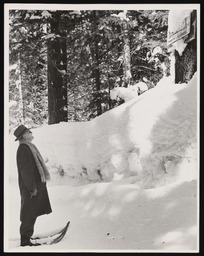 Dr. Church viewing Tahoe snow levels sign