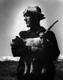 Sheepherder with lamb