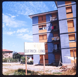 Building with Guernica y Luno sign in foreground 