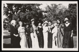 Group of women standing in costume