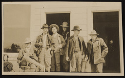 Charles Sparks standing with unidentified men