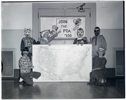Children in costumes advertising the PTA