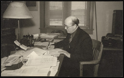 Dr. Church sitting in office, copy 4
