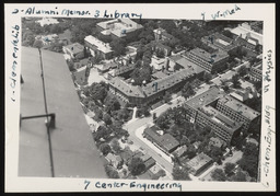 Aerial view of University of Michigan, airplane wing visible