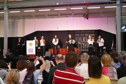 Musical performance with spectators during Opening Ceremony of the Smithsonian Folklife Festival 2016