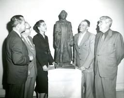 Yolanda Jacobson Sheppard with U. S. Senator Pat McCarran sculpture, 1959