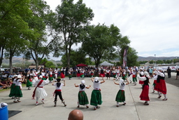 Young dancers with arms raised at 2021 Basque Festival in Elko