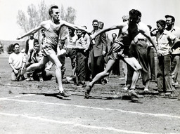 Men's track and field baton exchange, University of Nevada, 1945
