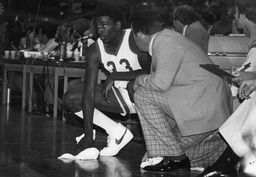James "Jim" Carey with player, University of Nevada, 1979