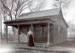 Wilhelmina Dressler in front of her house in Carson Valley