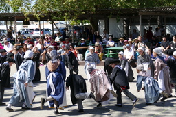 Young Basque dancers performing in circle