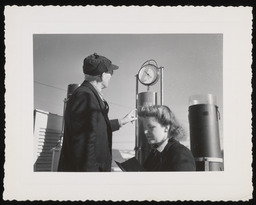 Dr. Church and woman with snow monitoring equipment