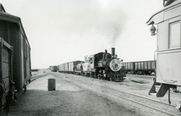 Southern Pacific narrow gauge Locomotive No. 18 making up its train at Owenyo, before leaving for Laws (1950)