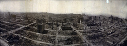 Bird's-eye view of ruins of San Francisco from captive airship 600 feet above Folsom between Fifth and Sixth Streets