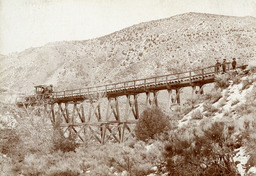 The Eureka Mill Railroad's Porter Locomotive No. 1 crossing the Gold Canyon trestle