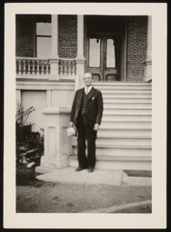 Dr. Church standing in front of Morrill Hall