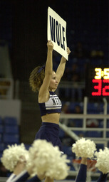 Cheerleader holding a Wolf sign, University of Nevada, circa late 1990s