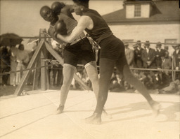Jack Johnson and Walter Monahan sparring in ring