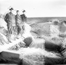 Men standing on top of Pyramid Lake Dam