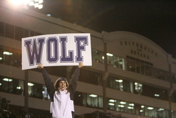 Cheerleader holds Wolf sign at home game, University of Nevada, November 16, 2007