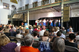 Biotzetik Basque Choir in colorful costume, wide shot