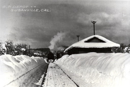 Eastbound locomotive at Susanville depot in winter (ca. 1914)