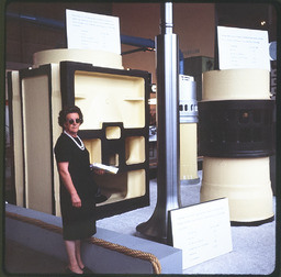 Woman standing by an exhibit