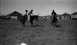 Bronc riding rodeo