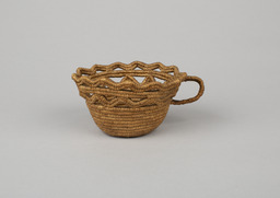 Cup with handle and fancy rim