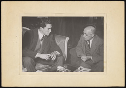 Dr. Church in conversation with man