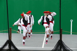 Oinkari male dancers, legs raised