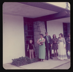 Bill, Delores, and Terry with Leland Jr. and Patricia Sparks outside a church