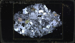 Thin section 54NC316, quartz monzonite (polarized)