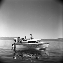 Men on boat at Skunk Harbor on Lake Tahoe