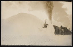 Southern Pacific Railroad train plowing snow