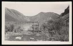 Equipment in water at Moleen Station with view of mountains