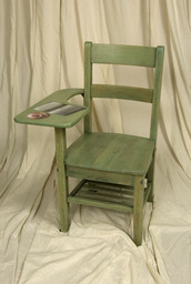 Green Chair with Book and Apple