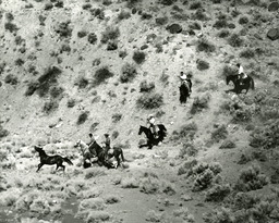 Indian hunters chasing a wild horse