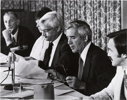 Photograph of Paul Laxalt, Jim Santini, and others at a panel, Circa 1978