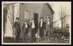 Charles Sparks with four other men wearing suits and hats