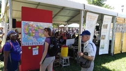 On the Move Speaker Series tent with migration map