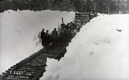 Laying rail in 8 feet of solid snow (ca. 1914)