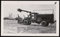 Snow removal equipment attached to truck