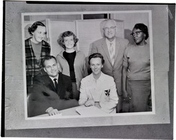 Winner of a $1,937 March of Dimes scholarship is Miss Anne Scott, seated, right