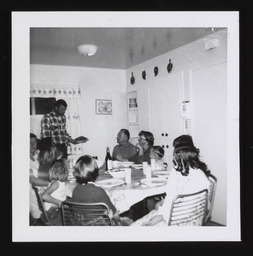 Photograph of a Sparks family dinner with Leland Jr. at the head