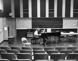 Music performers, piano player, Church Fine Arts Building ca. 1970