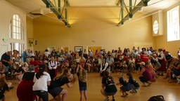 Adults and children dancing in circle at 2021 Reno Basque Festival